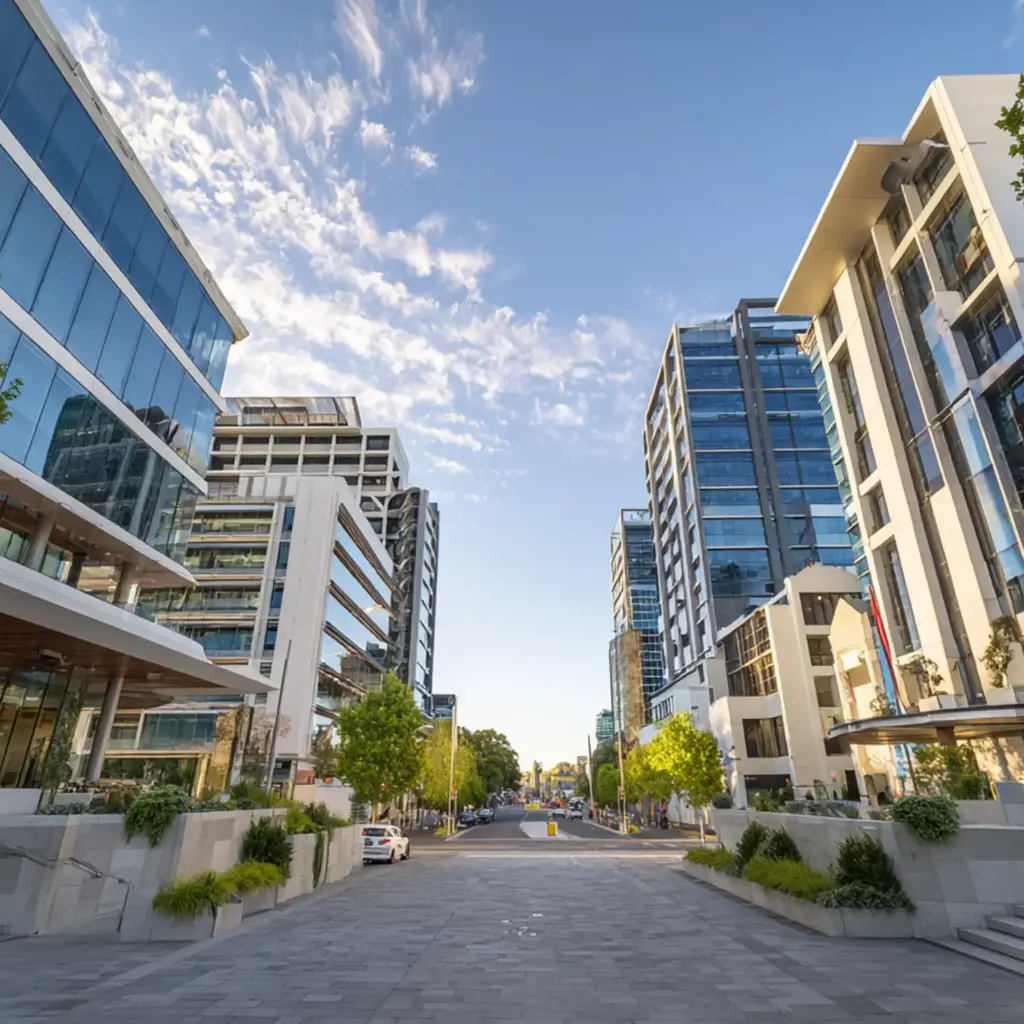 Business owner meeting with West Perth IT support partner to review technology challenges.